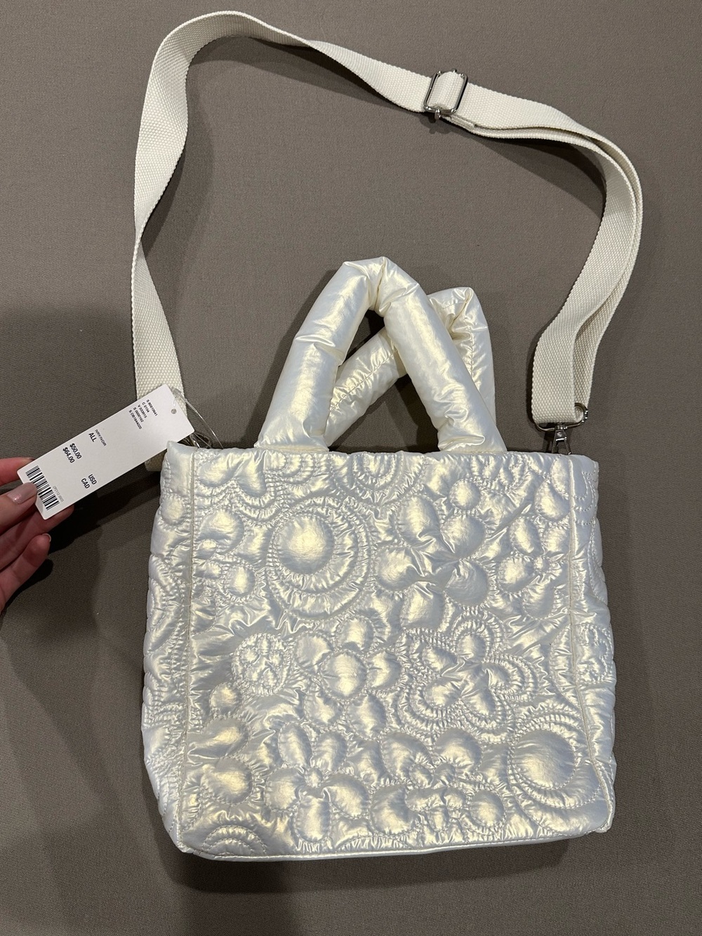 Urban Outfitters iridescent puffy tote bag
